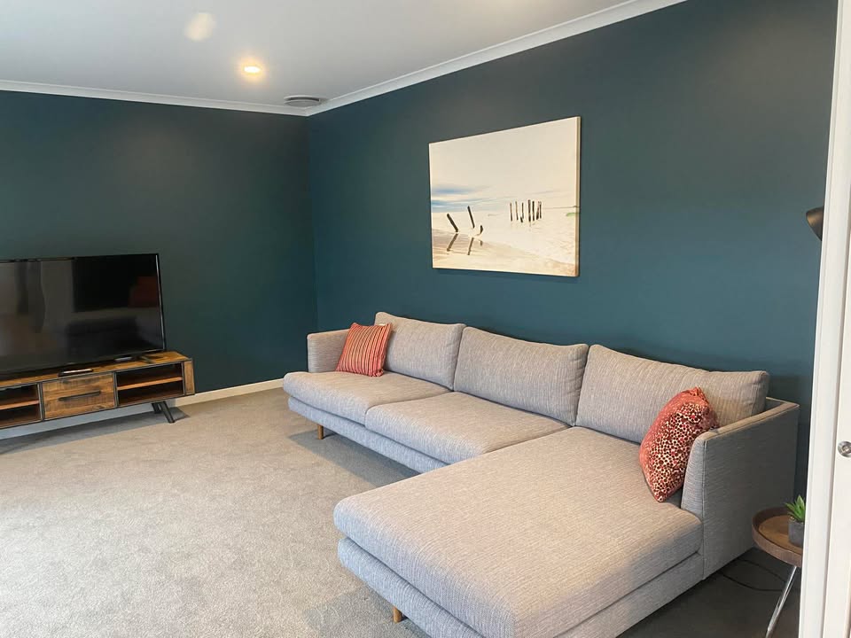 Showhome entertainment room painting in Dunedin — smooth interior finish